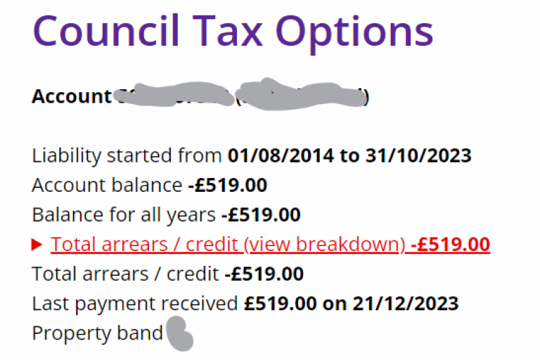 In red: 'Total arrears / credit (view breakdown): -£519'. Below that, in black: 'Total arrears / credit: -£519'